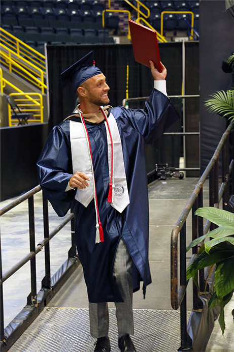 Graduate wearing a customized cap