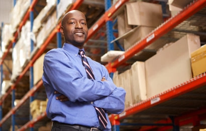 management graduate smiling at work