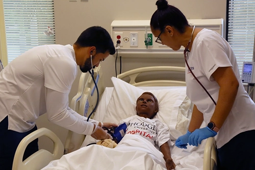 Hodges University students taking part in a simulation exercise in the state-of-the-art nursing lab